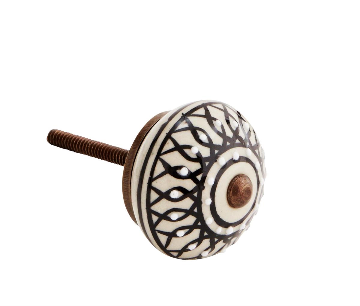 Hand painted stoneware doorknob, Off white, black, ant.brass